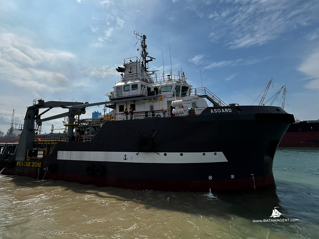 AHTS vessel Asgard departing from the jetty in Batam after completing repair and re-activation works, with departure arrangements organized by PT. Bisa Jasa Segara (Batam Shipping Agency), a ship agency company based in Batam, Indonesia.