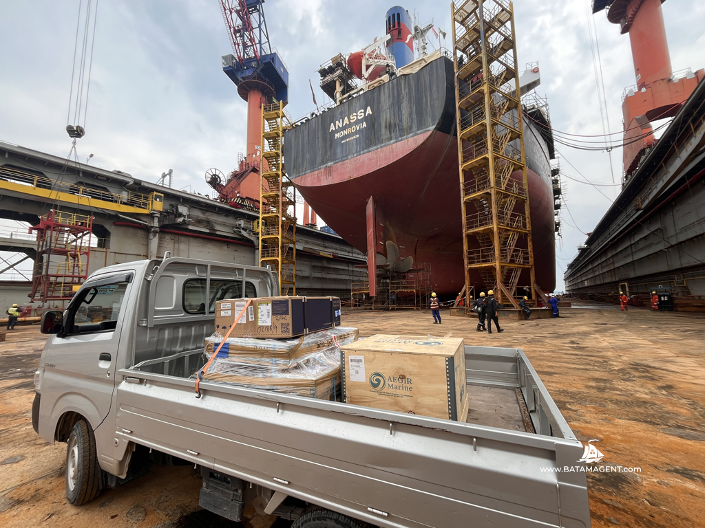 Ship spares logistics activity alongside MV ANASSA at the shipyard in Batam.